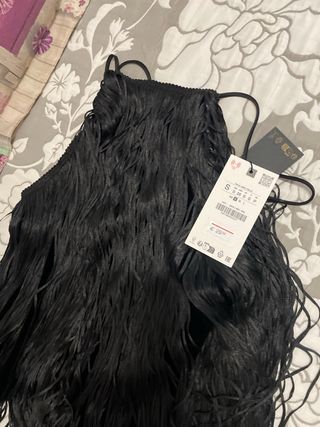 Top de flecos negro
