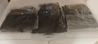 Pantalones de chándal negros , tres piezas.