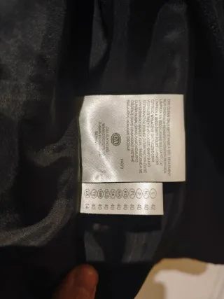 Blazer C&A negro con tachuelas