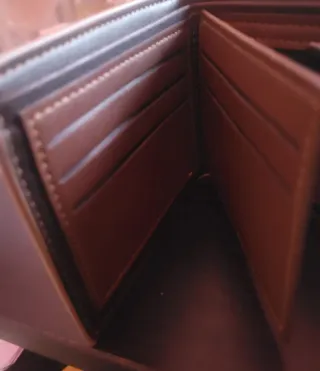 Cartera de piel con león y nombre Manuel