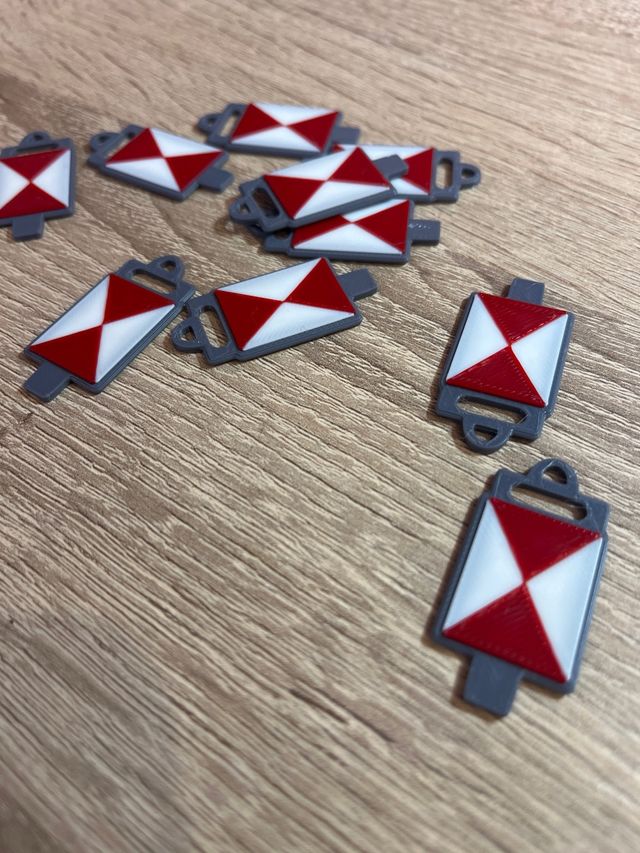 Llavero cartelón de cola de tren