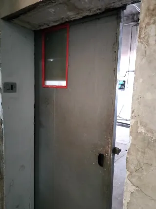 Puerta corredera industrial hierro