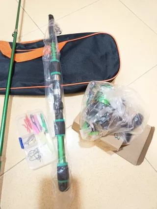 Dos caña de pescar y carrete de1'80