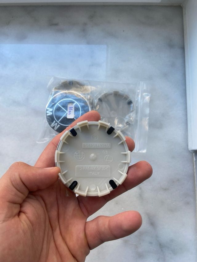 4 Tapabujes BMW 68mm negros nuevos