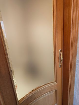 Puertas correderas de madera acristaladas