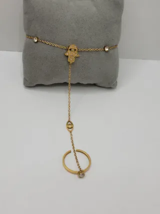 Pulsera mano de acero quirúrgico chapado en oro