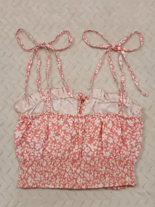 Top floral rosa con tirante