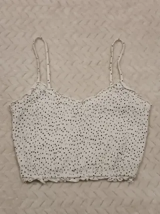 Top floral rosa con tirante