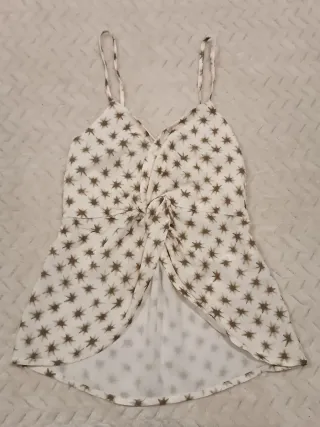 Top floral rosa con tirante