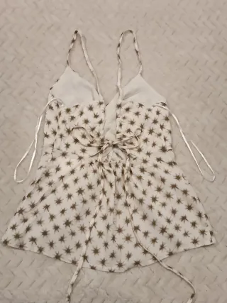 Top floral rosa con tirante