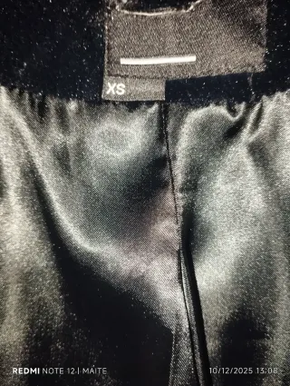 Torera fiesta pelo sintético negro