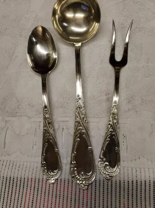 Mestolo e posate decorate