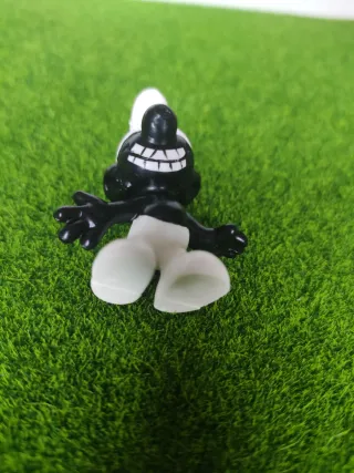 Puffo Pitufo nero fake español