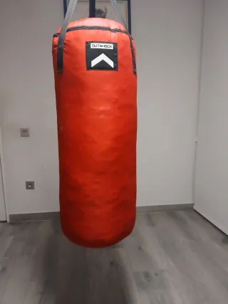 Saco y guantes de boxeo