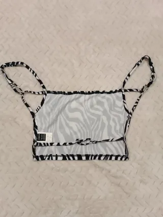 Top blanco con lazada y detalles