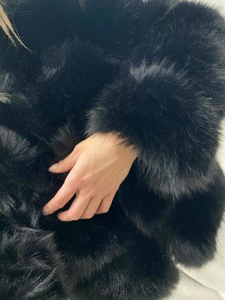 Abrigo pelo sintético negro