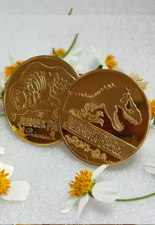 Lote Jurassic Park: Caja Música, Monedas y figura