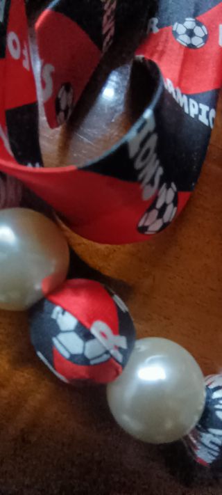 Collana Champion con palline e nastro