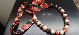 Collana Champion con palline e nastro