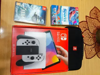 Nintendo Switch OLED + juegos + accesorios
