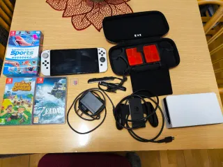 Nintendo Switch OLED + juegos + accesorios
