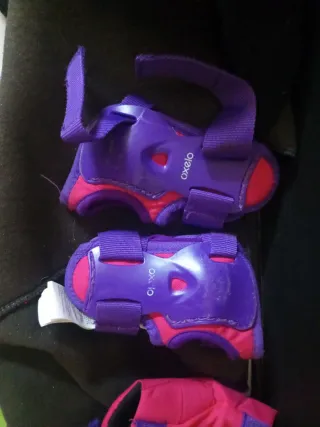 Rodilleras y coderas Oxelo moradas y fucsia