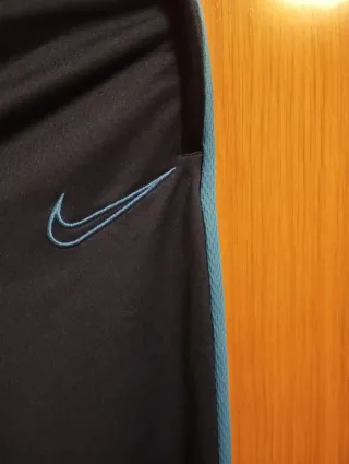 Pantalón chándal Nike hombre azul de entretiempo