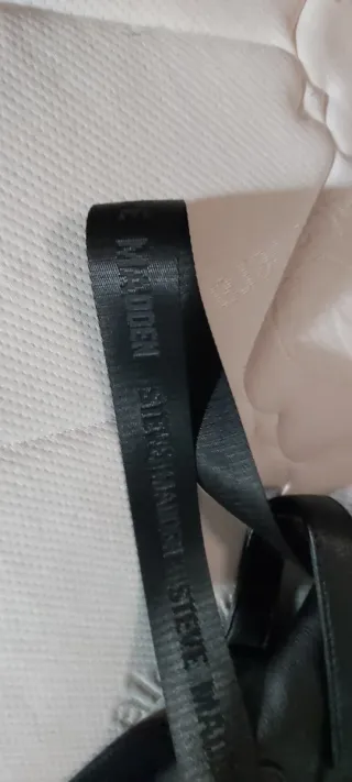 Mochila pequeña negra con monedero