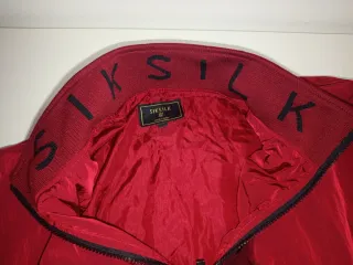 Chaqueta cortavientos SikSilk burdeos