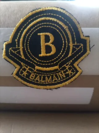 Toppa Balmain nera e oro