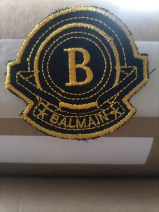 Toppa Balmain nera e oro