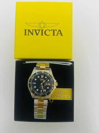 Reloj Invicta Oro y Plata