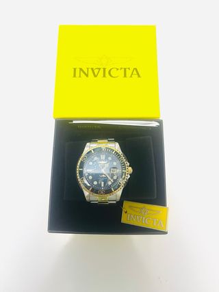Reloj Invicta Oro y Plata