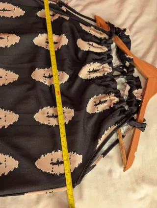 Vestido largo estampado negro y beige