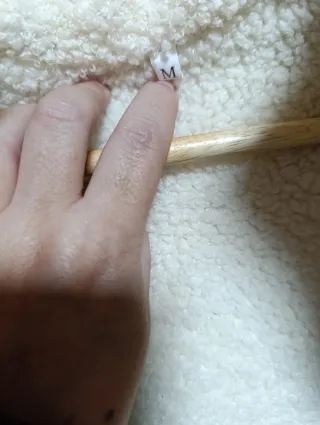 Chaqueta verde acolchada con capucha