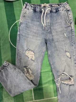 Pantalones grises Pull&Bear rasgados