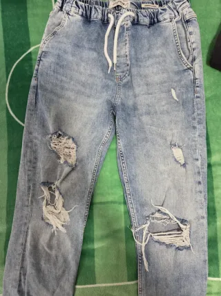 Pantalones grises Pull&Bear rasgados