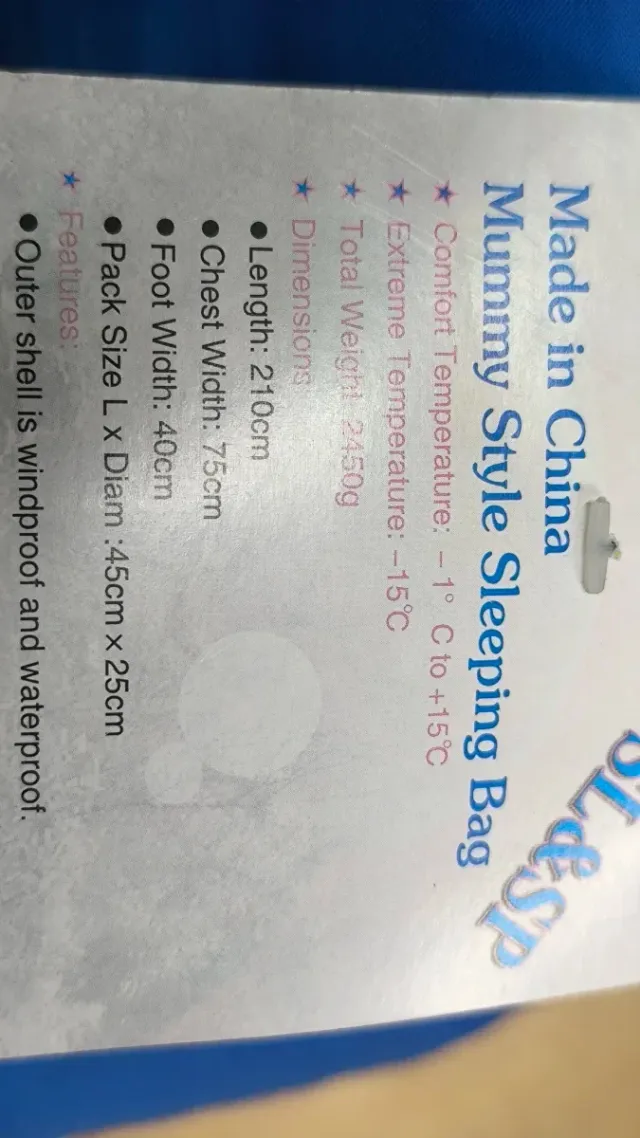 Saco de dormir azul con bolsa