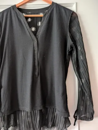 Blusa negra lunares plateados