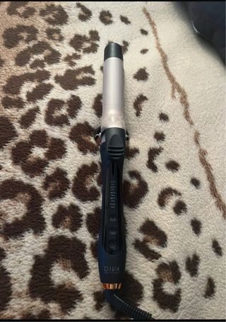 Rizador de pelo profesional negro y verde