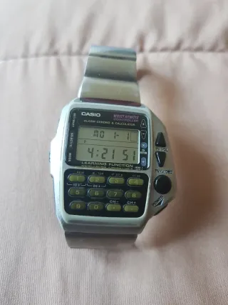 Reloj Casio Calculadora Gris y Plateado