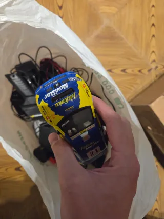 Mandos, transformadores y coche Scalextric