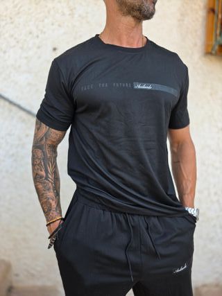 Conjunto deportivo hombre negro