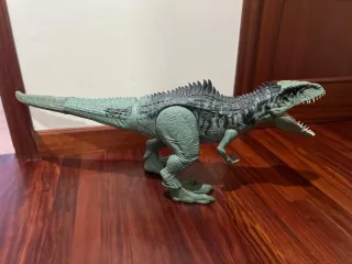 Dinosaurio de juguete verde