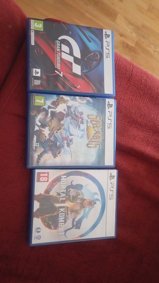 PS5 con mando y juegos