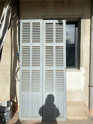 Puerta doble de terraza con lamas