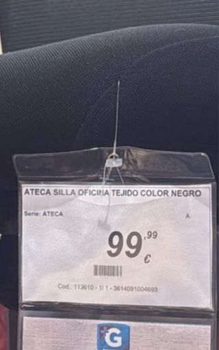 Silla de oficina negra, tela y plástico
