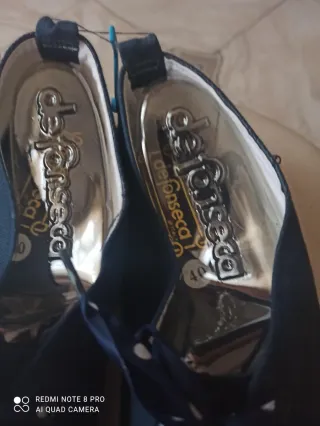 Scarpe de.pressa blu con fiocco pois