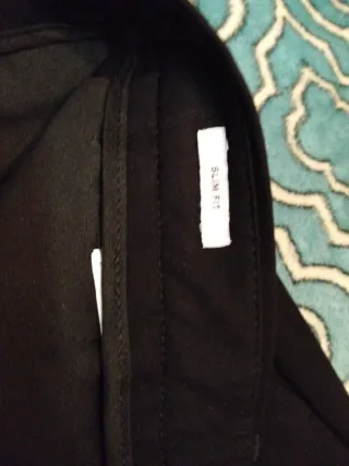 Traje de chaqueta y pantalón negro