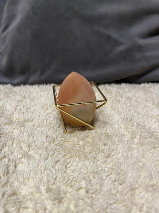 Organizador de maquillaje dorado